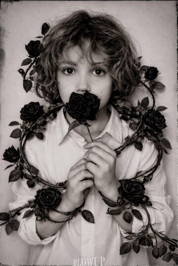Semyon poses with roses