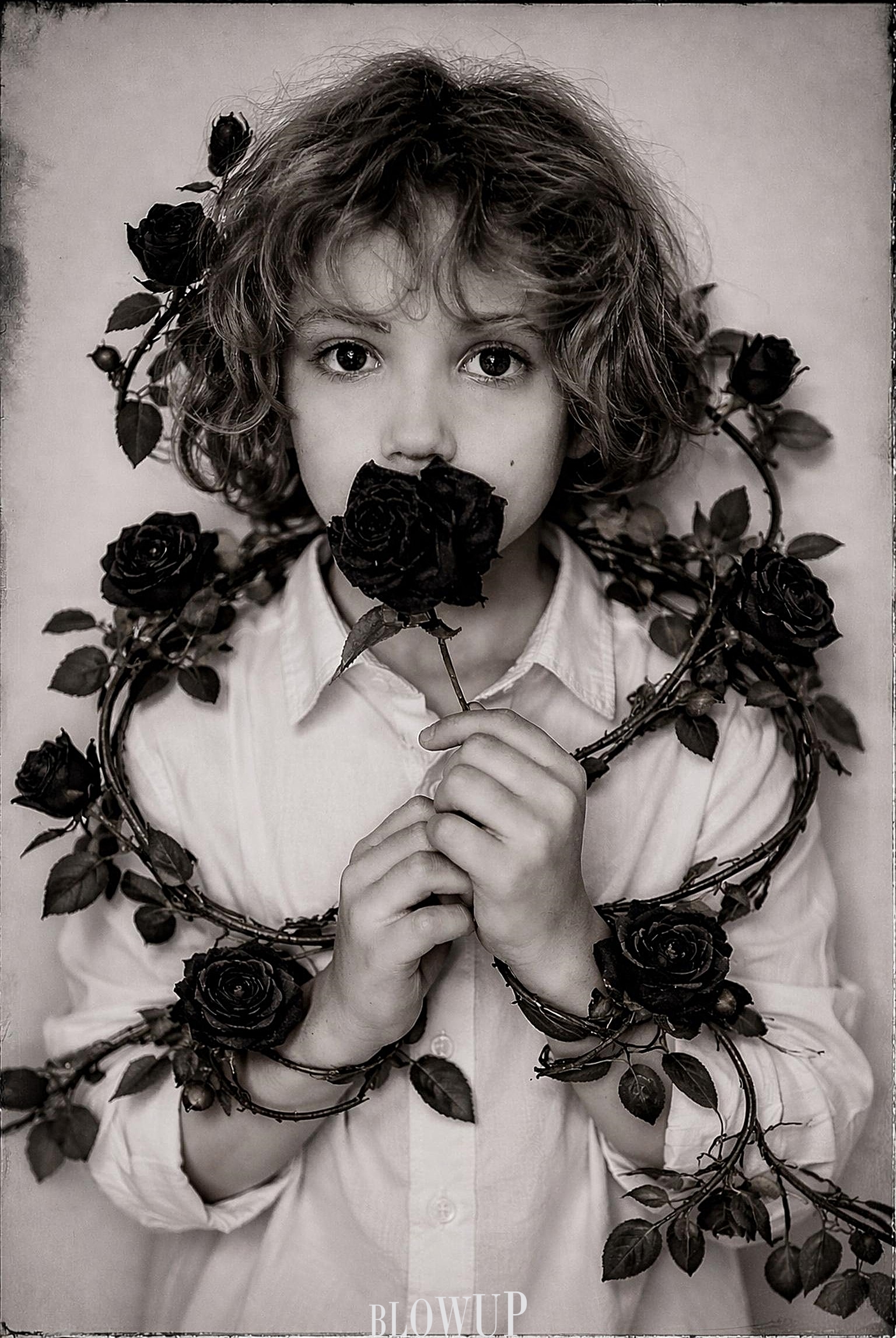Semyon poses with roses
