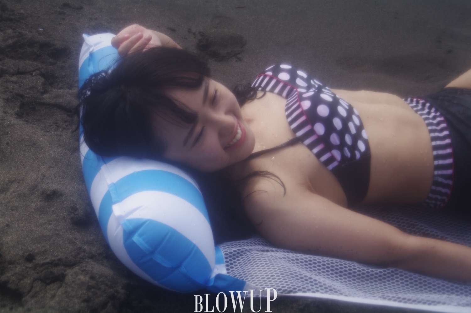 Swimsuit model Hana on the beach